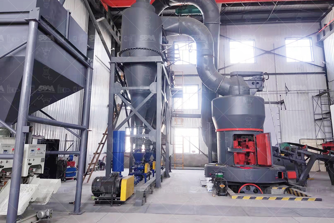 Close-up of an advanced automated control system panel for a grinding mill, showing digital readouts